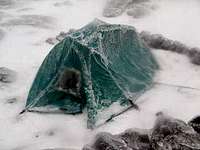 The tent, covered with ice...