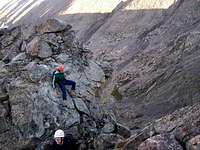 Climbers downclimbing an...