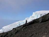 glacier with rock sculpture