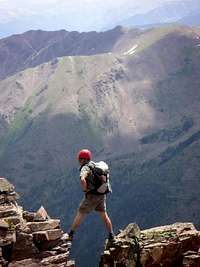 Jesse Hill descending Pyramid Peak's Northeast Ridge/East Face.  July 15, 2006.
