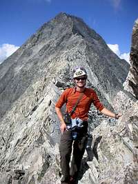 Me, the Knife-Edge, and Capitol Peak after our climb, July 23, 2006.
