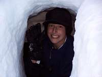 Tyler J. emerging from snowcave during Boy Scout Klondike in February, 2006