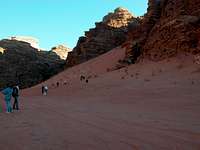 Red sand and tourists