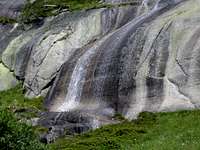 Beautiful waterfall near Grimsel storage lake
