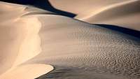 Wind blowing sand off the Panamint Dunes