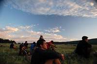 The crew watching the sunset at Apache Springs, Philmont