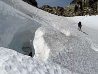 Negotiating bergscund onto Suiattle Glacier