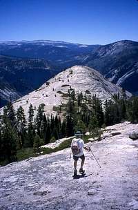 Hiker approaching North Dome...