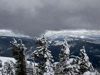 Snow coming down over Sierra...