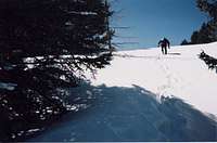 Jesus hiking the steep snow