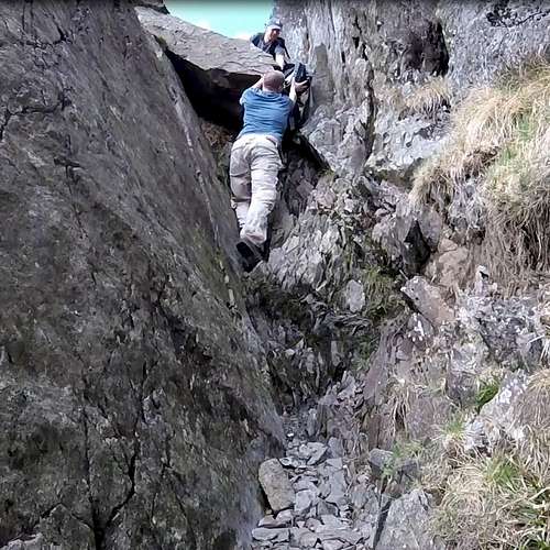 Climbing crux pitch in mid section of Jacks Rake