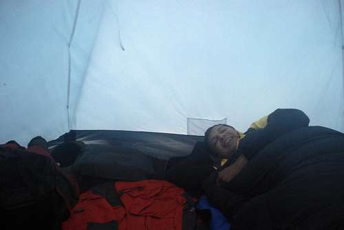 Rupesh resting in the tent at BC