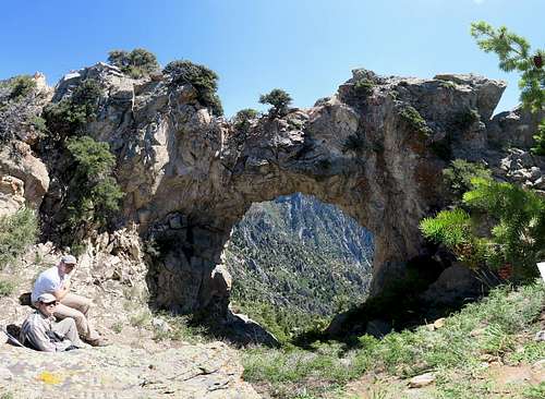 The Devil's Eye Arch and Dharma Peak (aka Willow Canyon Peak)