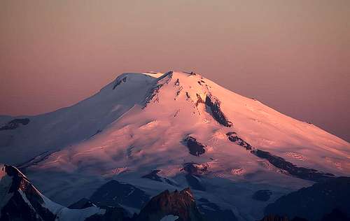 View of sunrise colors of Elbrus from the top of Tetnuld