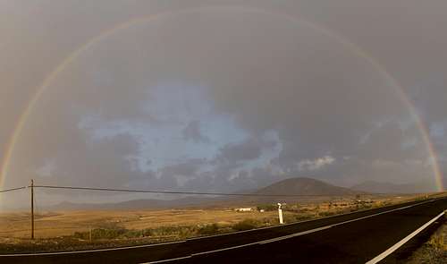 Slightly distorted rainbow above the Betancuria Range