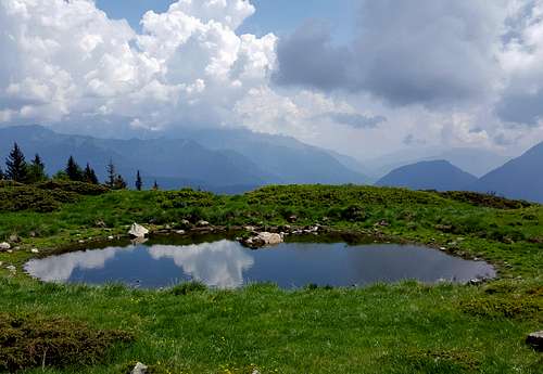 Small alpine pond on the route to Monte Cengledino