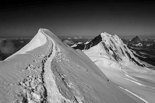 Parrotspitze (14540 ft / 4432 m) summit ridge with Lyskamm (14852 ft / 4527 m) and Matterhorn
