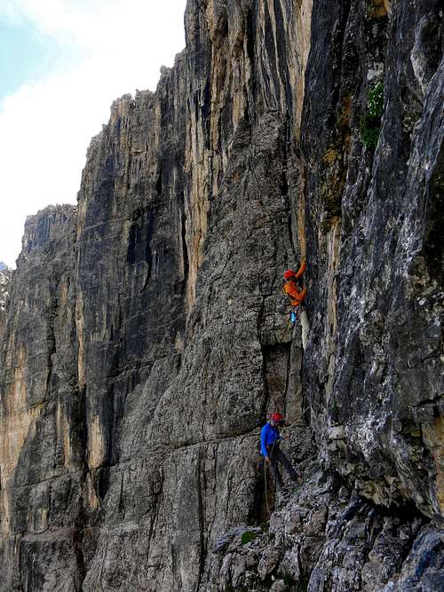 Climbers on a sport route near Pilastro Priolo, Lastoni di Formin