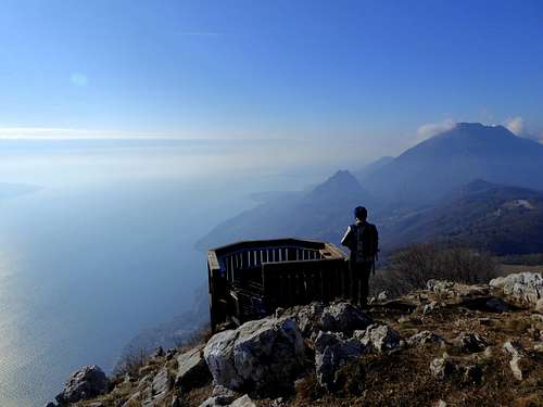 Admiring the view over Monte Pizzocolo and the lake