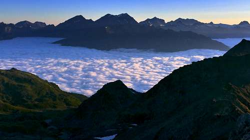 View from Bella Tola (3052 m ) to Bernese Alps, Rhone valley in clouds