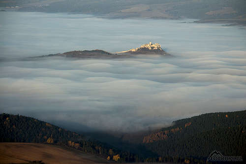 Spis castle over morning mist