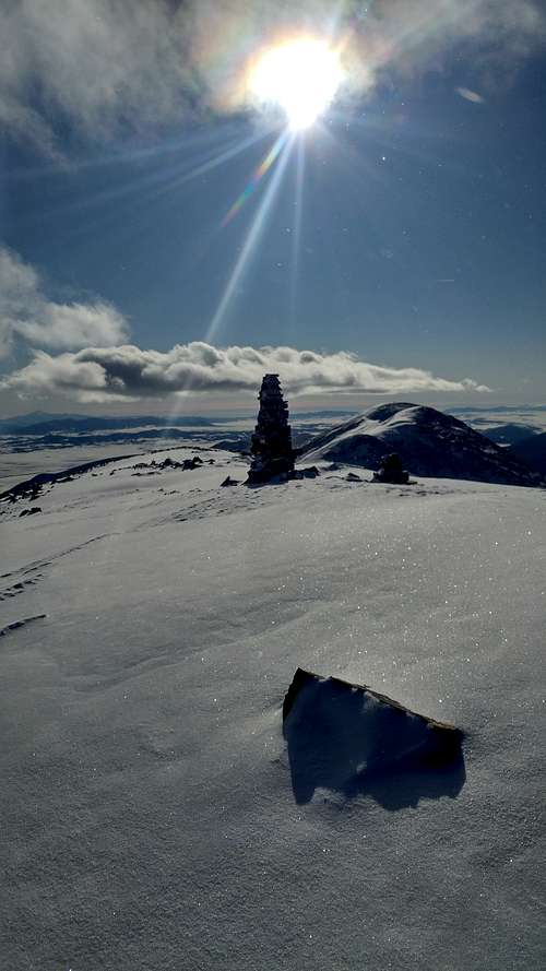 Sun shining on Bald Mtn.