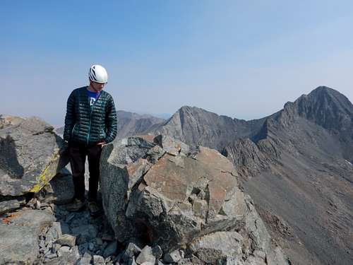 Kessler on the summit of Little Bear Peak