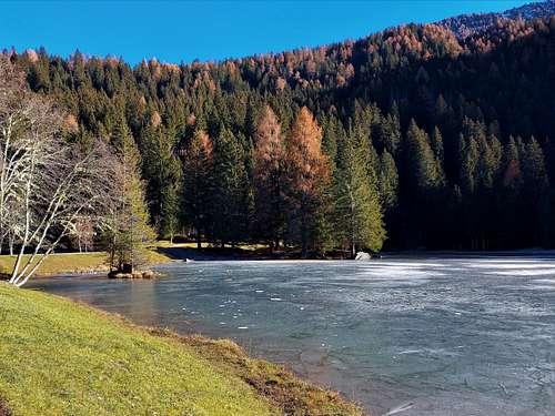 The frozen surface of Lake Caprioli, Val di Sole