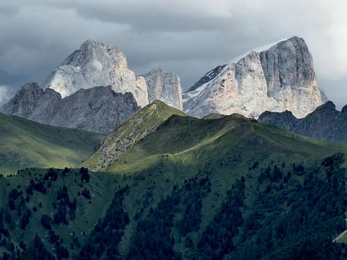 Western view of the mighty South Wall of Marmolada from the surrounding of Ciampediè