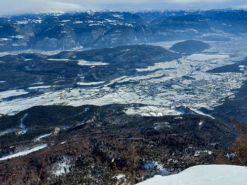 The Adige valley covered by snow seen from Monte Penegal