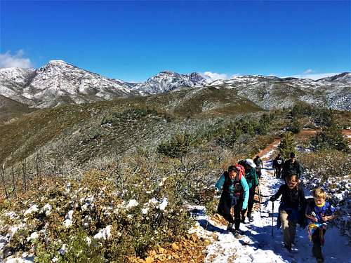 Group hiking up to the summit