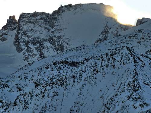 Last sunrays are touching the Gran Paradiso ridge