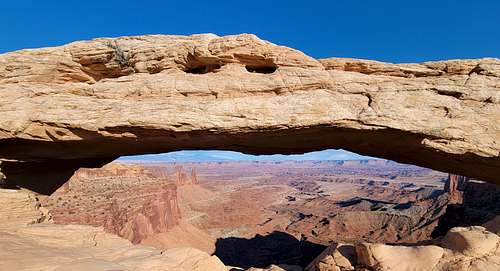 Looking through Mesa Arch