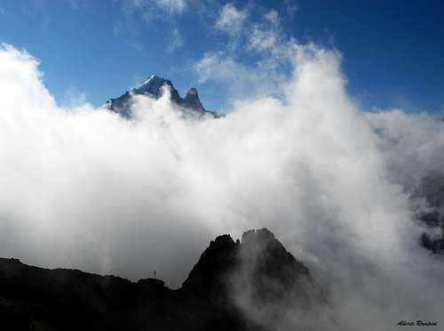 Aiguille Verte and Les Drus emerging from the clouds