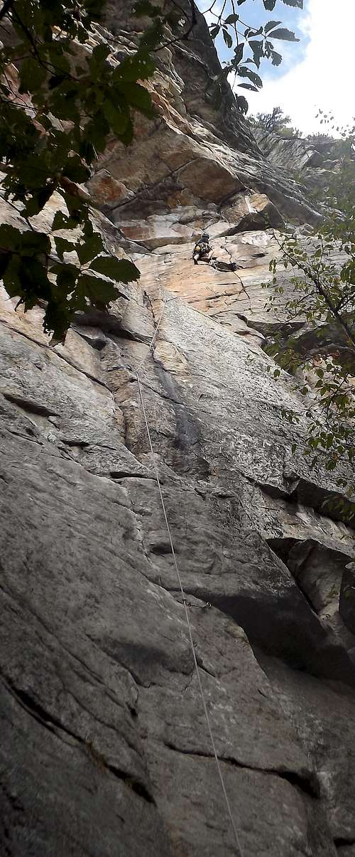 A climber finishes the first portion of the beautiful 'Baskerville Terrace' in the Near Trapps