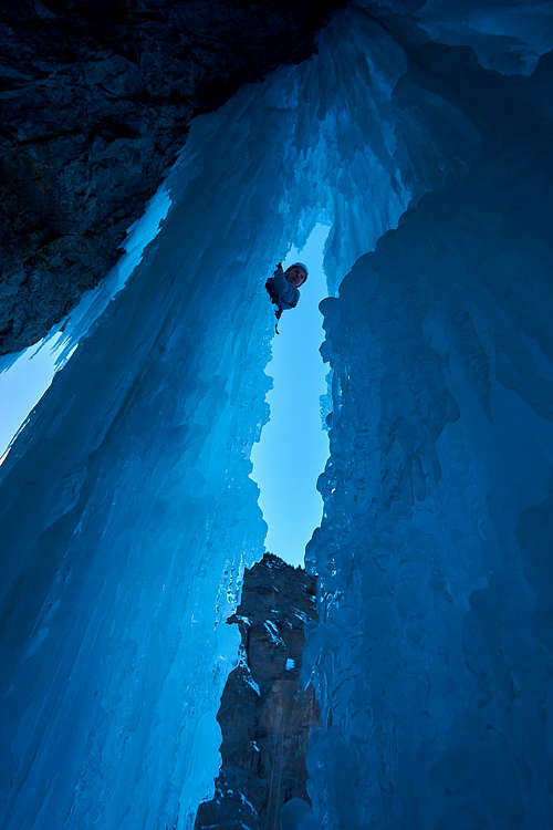 Peeking through a cave on City Ice Pillars