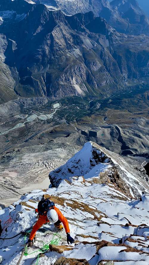A climber on the upper Hornligrat on Matterhorn