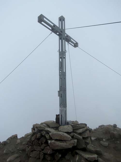 Summit cross in a cloud