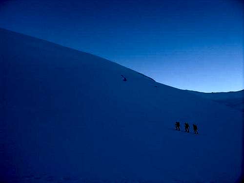 Three mountaineers walking...
