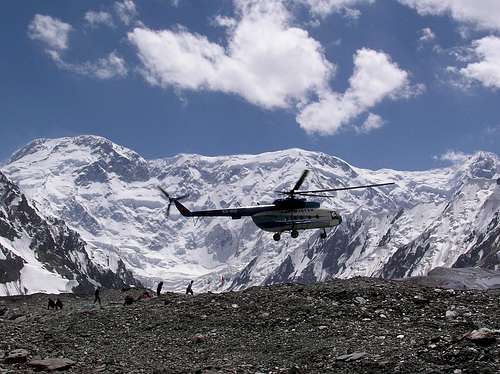 Helicopter arrives at Khan Tengri and Pik Pobeda's base camp