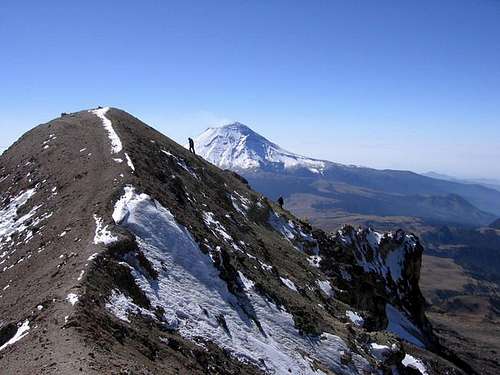 Climbers on the ridge of the...