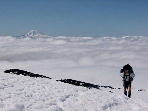 Above the clouds, climbing to...