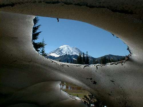 Mt. Rainier through a hole in...