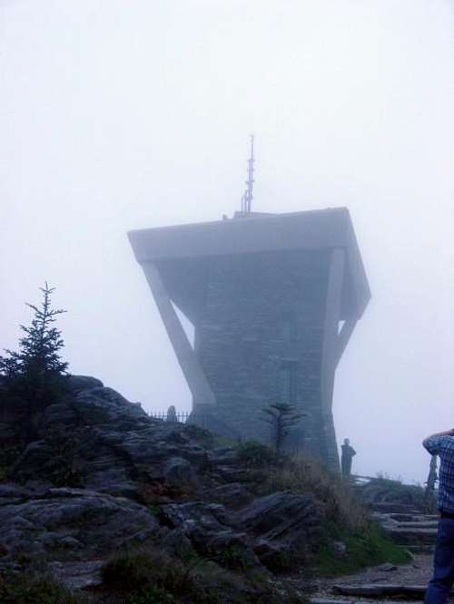 Tower on summit. Foggy day.