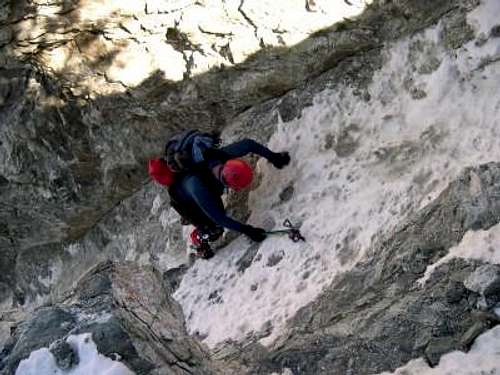  Mike Ostby climbing one of...