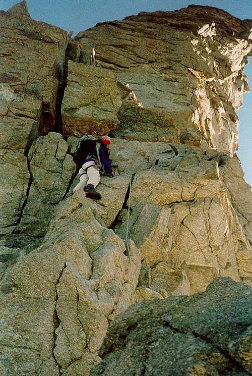 Climber on the rocks above the Gabel Notch