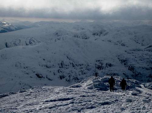 Climbers starting the descent of Meall Ghlas. March 2006