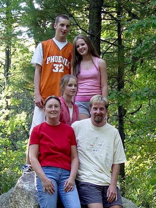 Family on a fall mountain hike