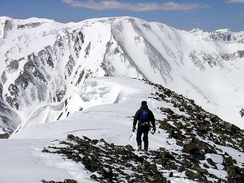 Descending the summit ridge