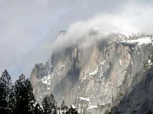 Half Dome as a front rolls in.